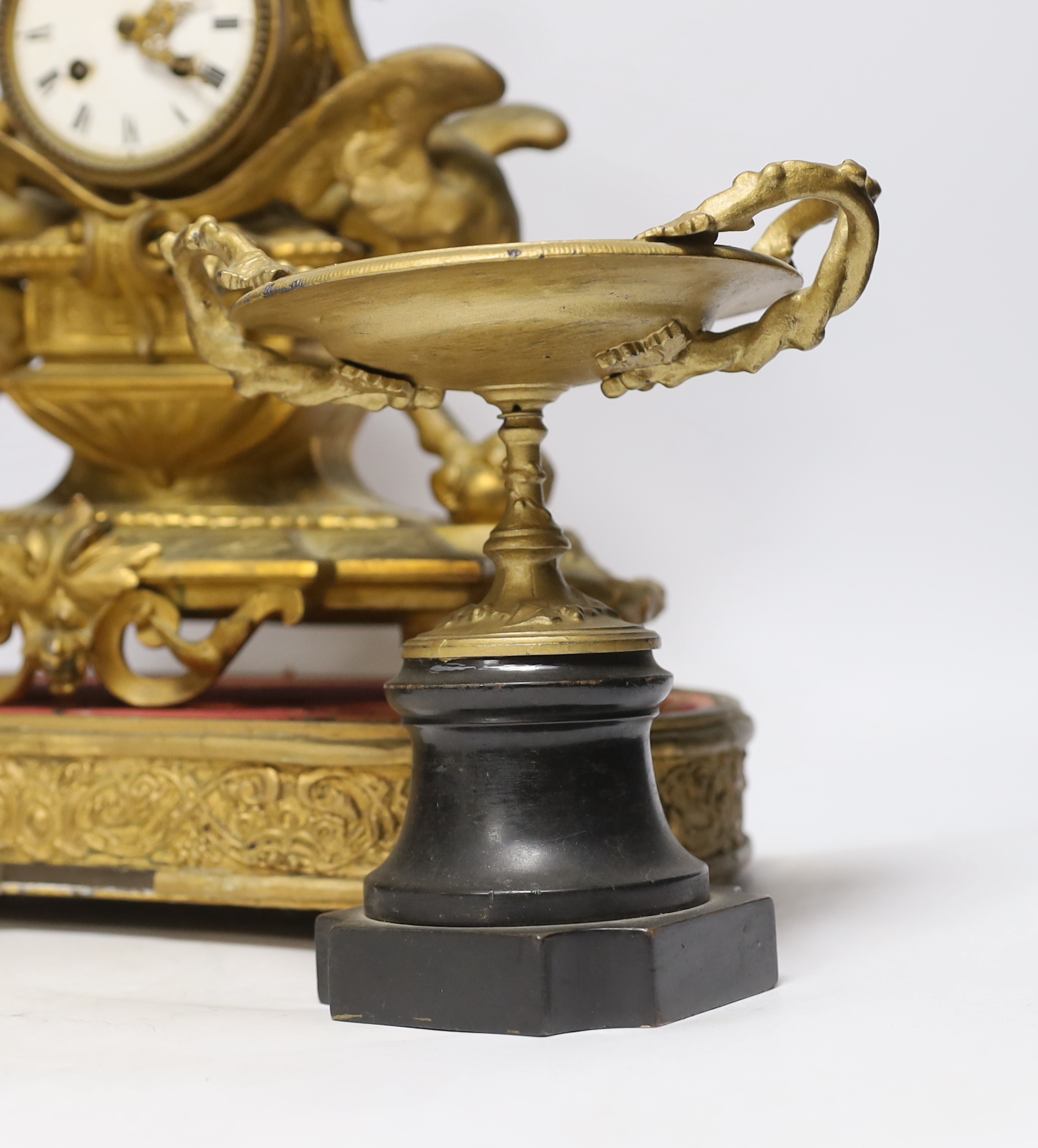 A Victorian gilt painted spelter mantel clock garniture, (dome missing) clock 43cm high